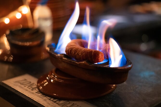 A True Taste of Lisbon: Portuguese Tapas, Wine & Surprise Drink - Starting at Praça Luís de Camões at 7 p.m.