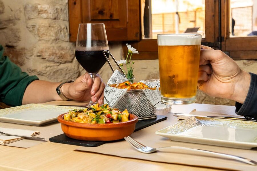 Alcudia: Self-Guided Gourmet Tapas and Wine Tour - Four tapas, four drinks, and one old-town walk