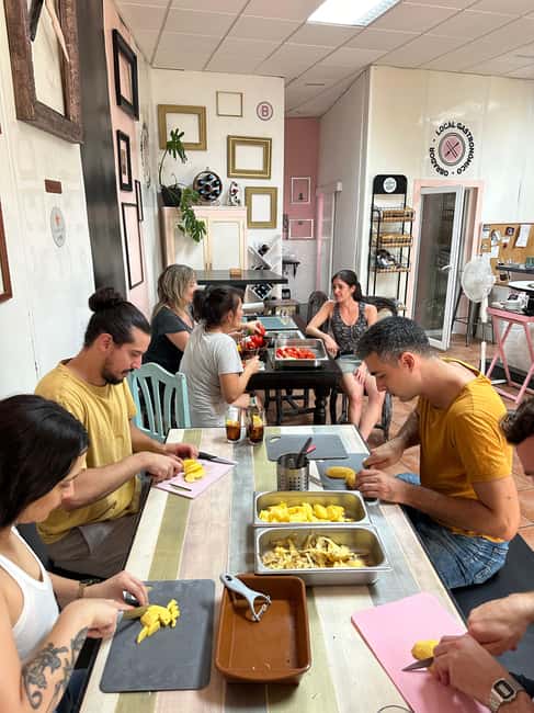 Alicante:Evening Spanish Tapas Cooking Class with Live Music - Fresh market shopping adds real local context