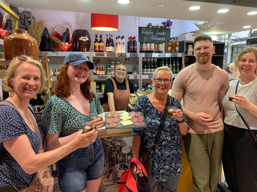 Alicante: Guided Tapas Tour by Bike with Tastings - Riding through the colourful Old Town