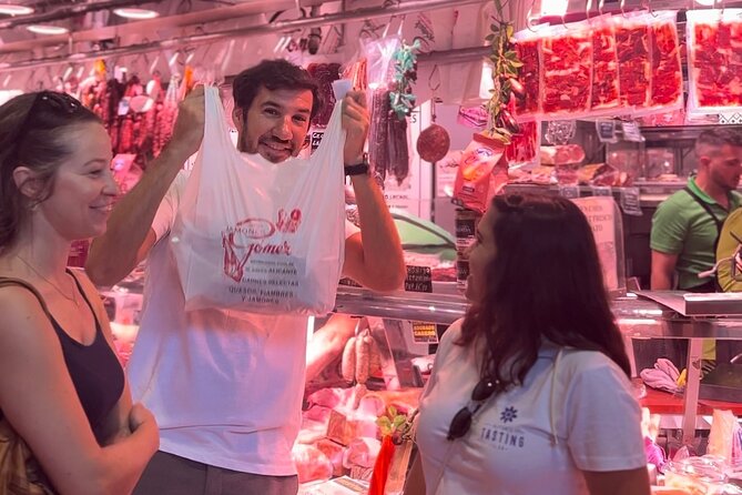 Alicante Paella Cooking Class, Tapas, Drinks and Marketplace - Eating the paella you helped make