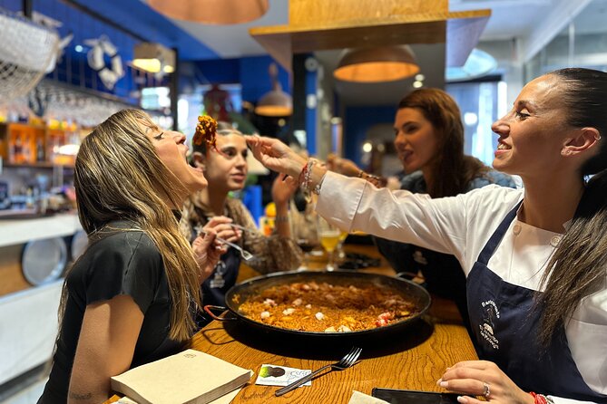 Authentic Paella in Madrid: A Hands-On Class with Tapas & Sangria - Tapas, olives, and drinks while the paella cooks