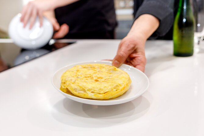 Authentic Tapas Cooking Class at a Private Local Eatery in Madrid - Starting with four Spanish dishes