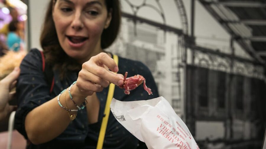 Barcelona: Food & Market Tapas Tour - The bodega brings regional drinks and Iberian ham