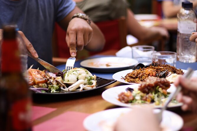 Barcelona Food Tour: Tapas, Paella, Sangria & 8+ Local Tastings - Plaça de Ramon Berenguer el Gran sets the tone