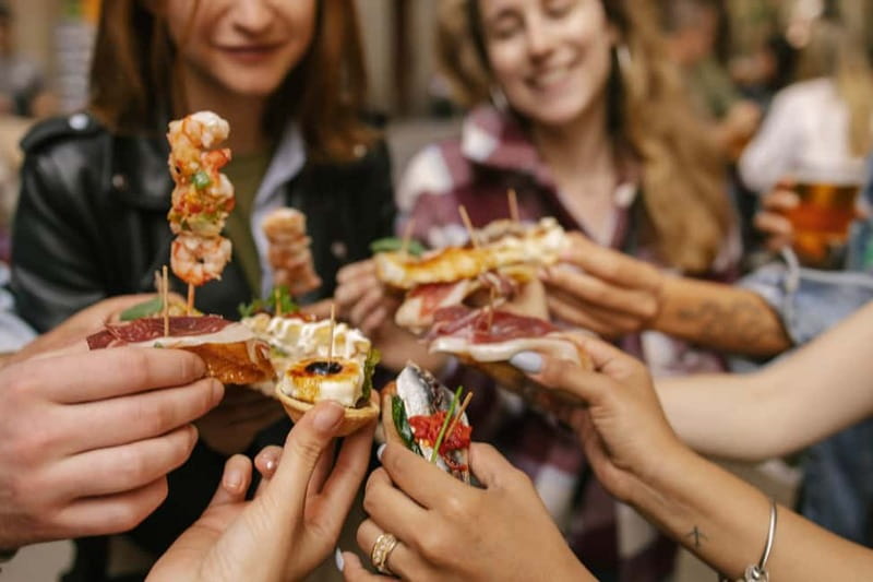 Barcelona: Food Walking Tour with Tapas and Wine - Four tapas stops make the $100 price easier to judge