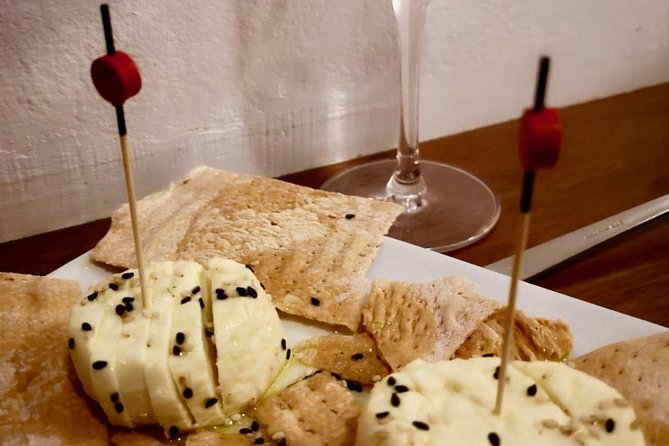 Barcelona Gothic Quarter VIP Tapas & Wine Tour - Stop one: family cooking on Carrer dels Assaonadors