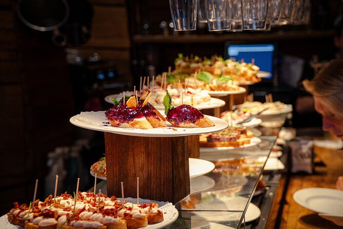 Barcelona Old City Guided Tour with Tapas and Drinks - Tapas, pintxos, and the toothpick trick