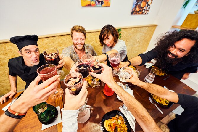 Barcelona Paella Cooking Class with Market Visit, Tapas & Sangria - From La Boqueria seafood stalls to the paella pan