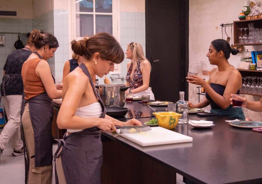 Barcelona: Paella & Tapas Cooking Class with Sangria - Preparing seafood paella step by step