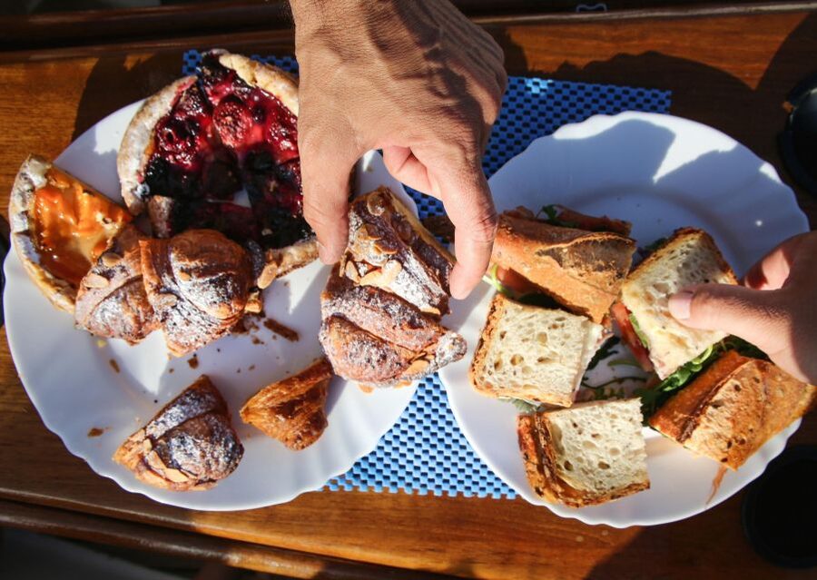 Barcelona: Sailing Tour with Spanish Tapas and Drinks - The Mediterranean swim stop
