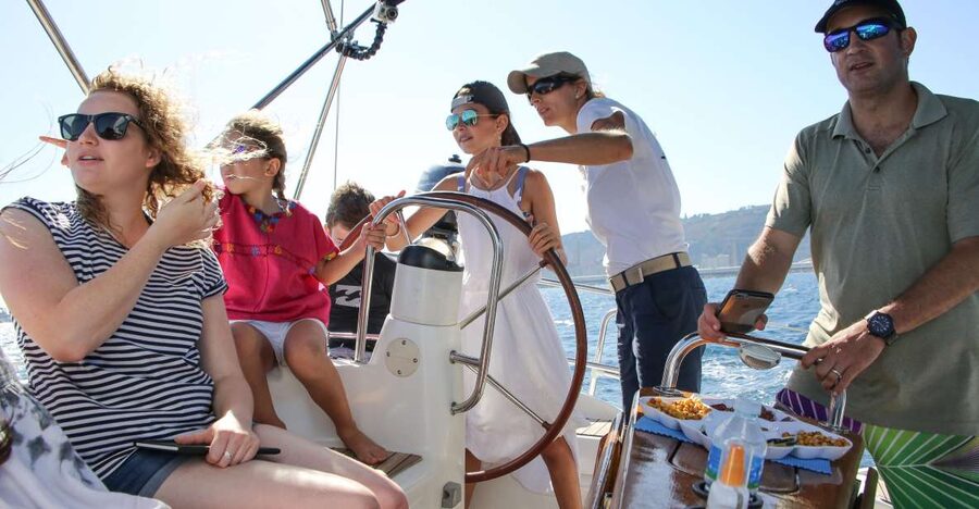 Barcelona: Sailing Tour with Spanish Tapas and Drinks - Captains who shape the experience
