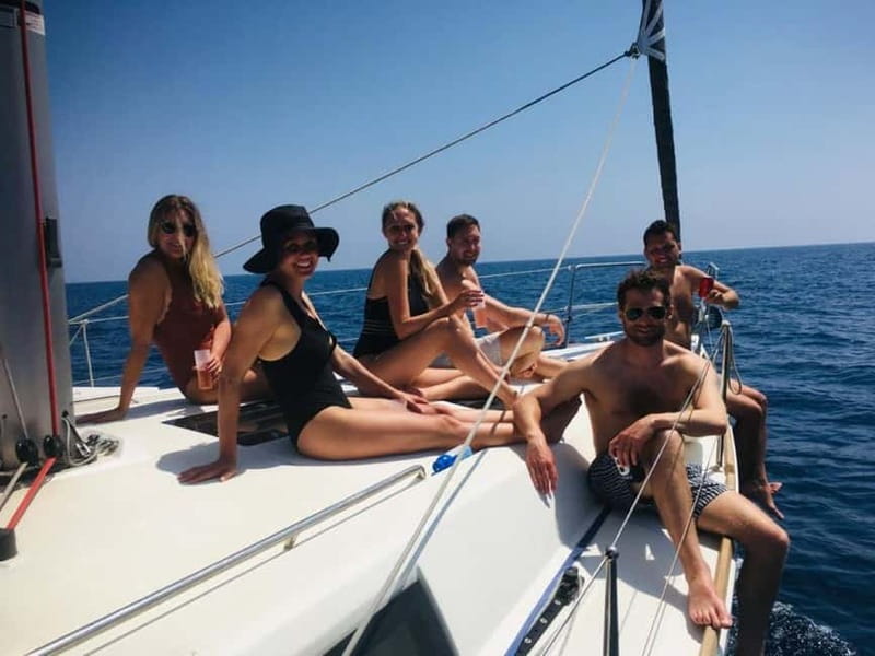 Barcelona: Sailing Tour with Tapas, Drinks and Swim Stop - Sailing past Barceloneta Beach