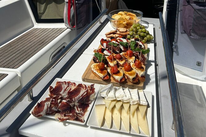 Barcelona: Sailing Tour with Tapas, Drinks, Swim & Sunset Option - Boat comfort and expectations