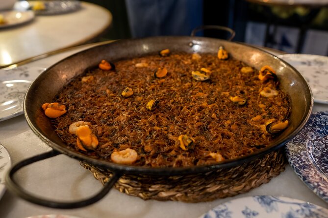 Barcelona Side Streets Tapas & Wine Tour - Fideuà in Barceloneta’s oldest house