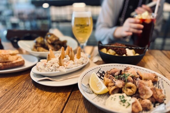 Barcelona Sightseeing by Bike with Photo Shooting and Tapas - Port Vell and Barceloneta: Barcelona meets the sea