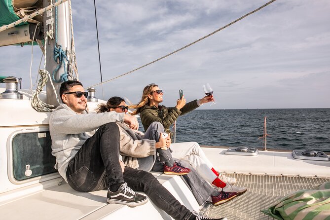 Barcelona Small Group Trip by Catamaran w Tapas, Cava and Sunset - Port Vell with tapas and cava