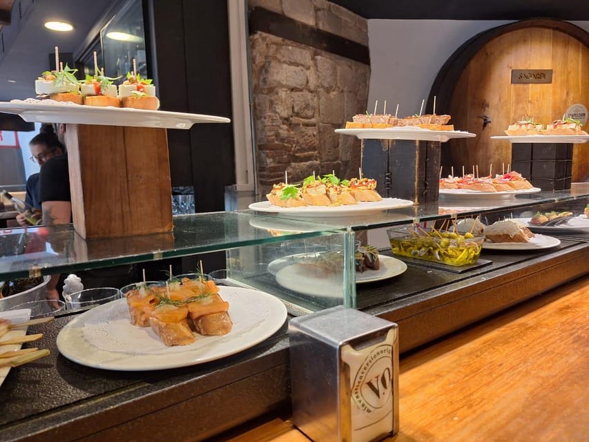 Barcelona: Tapas and Pintxos Tour with Crema Catalana - Key points at a glance