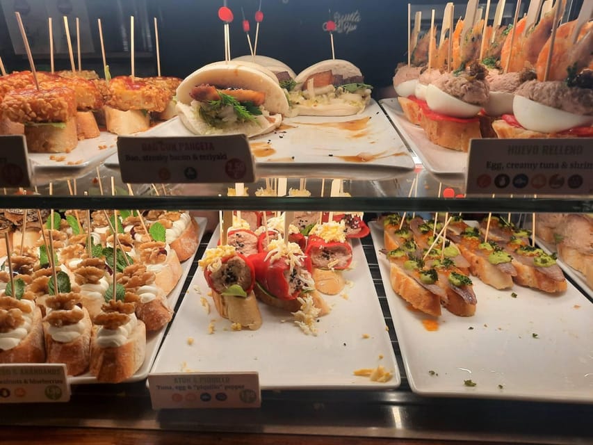 Barcelona: Tapas and Pintxos Tour with Crema Catalana - What the 2.5-hour schedule is likely to feel like
