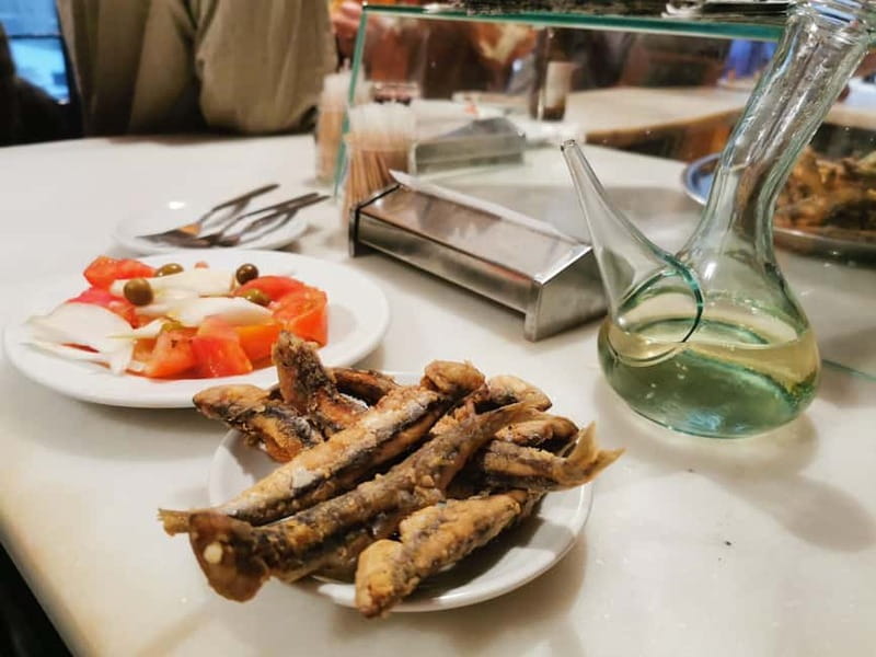 Barcelona: Tapas and Wine at the Hidden Bodegas Experience - Gilda pintxos, paprika, and patatas bravas
