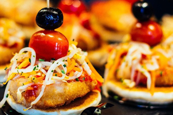 Barcelona With Locals: Wine and Tapas Private Tour - Walking Carrer de Blai, Barcelona’s tapas street