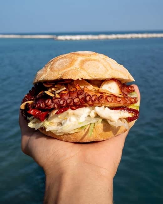Bari Sunset and Tapas: Street Food Tour with Local Guide - The octopus sandwich, Bari’s simple seafood bite