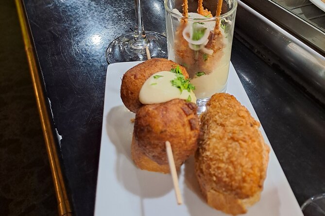 Bilbao Food Tour: Pintxos, Drinks, and Tapas with a Local - Andra Maria Kalea and the riverward food walk