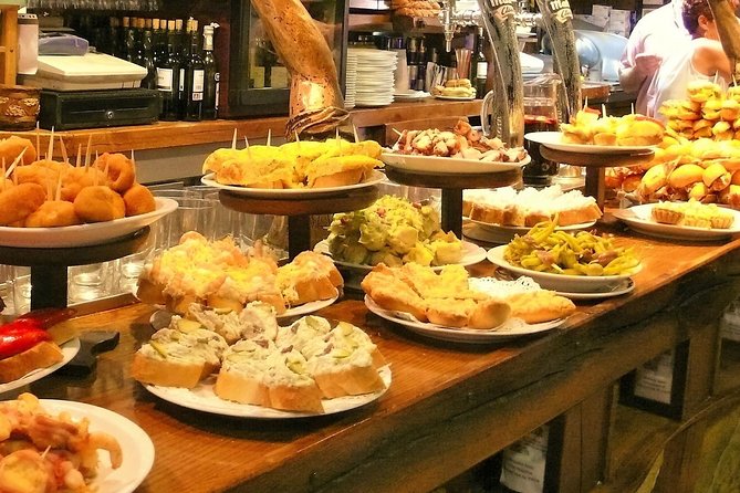 Boqueria & St Caterina Markets with Food & Tapas Small Group Tour - Santa Caterina Market and its wave-shaped roof