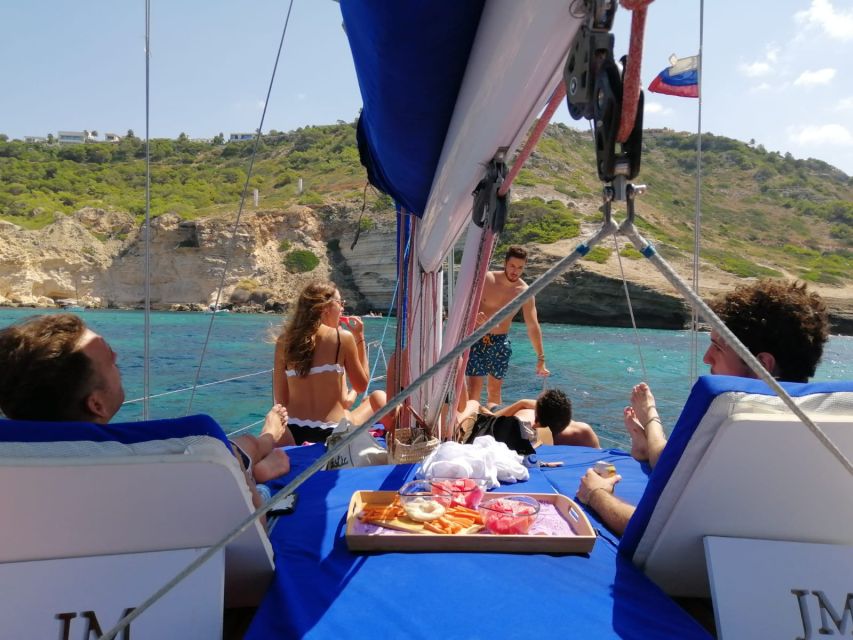 Can Pastilla: Sailboat Tour with Snorkeling, Tapas & Drinks - Tapas, cava, and a second coastal stop