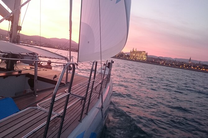 Catamaran sailing at sunset with tapas Palma de Mallorca - Returning past Palma Cathedral
