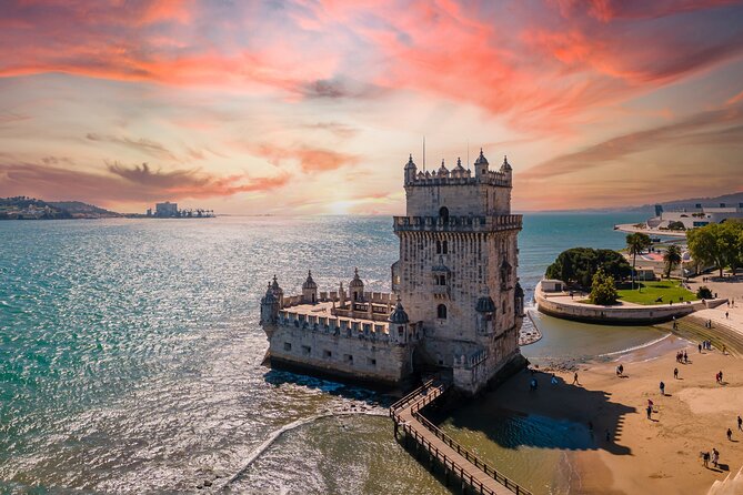Charms of Lisbon: Alfama Tapas Tour & Sunset Sailing with Wine - Portuguese tapas at one local tavern