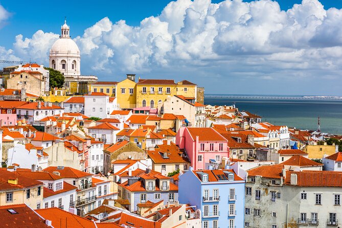 Charms of Lisbon: Alfama Tapas Tour & Sunset Sailing with Wine - Sailing the Tagus as Lisbon turns gold