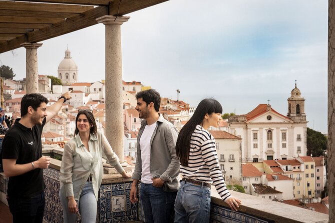 Charms of Lisbon: Alfama Tapas Tour & Sunset Sailing with Wine - Walking Alfama’s narrow lanes with a local guide