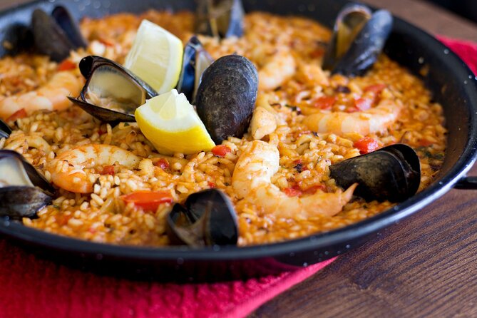 Cook Paella & Tapas + Market Tour in Barcelona (4-Course Meal) - Paella is the main reason to book