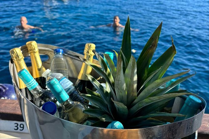 Coves and Caves Excursion with Tapas and Premium Open Bar in Ibiza - Practical timing and meeting details