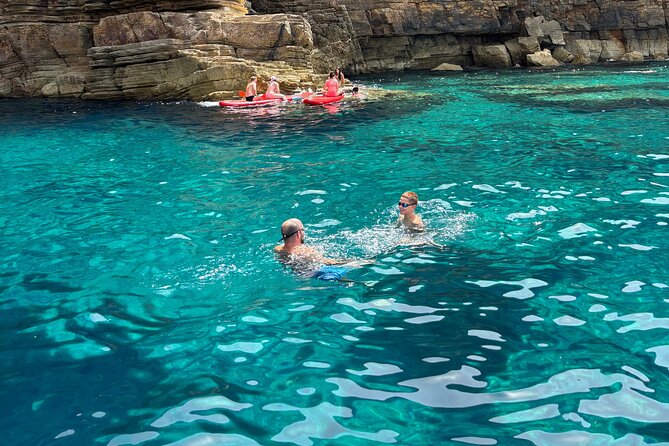 Coves and Caves Excursion with Tapas and Premium Open Bar in Ibiza - Why the Cala Bassa stop is the heart of the trip