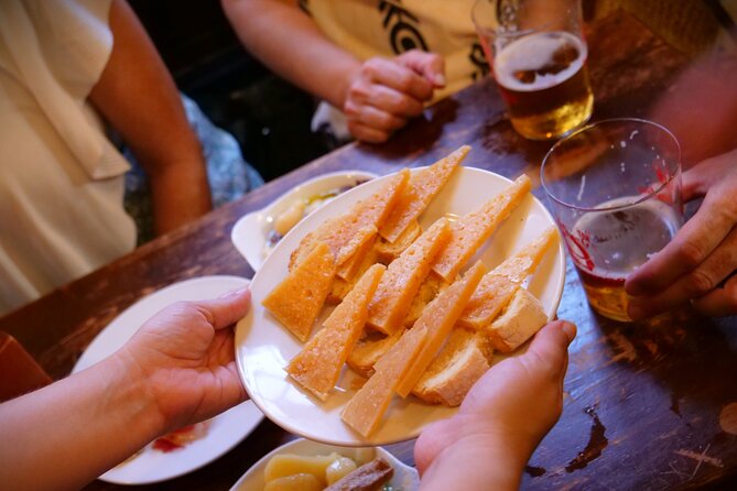 Eating Seville: Tapas, Drinks and Local Flavors Tour - Bodega La Aurora and the flaming chorizo lesson