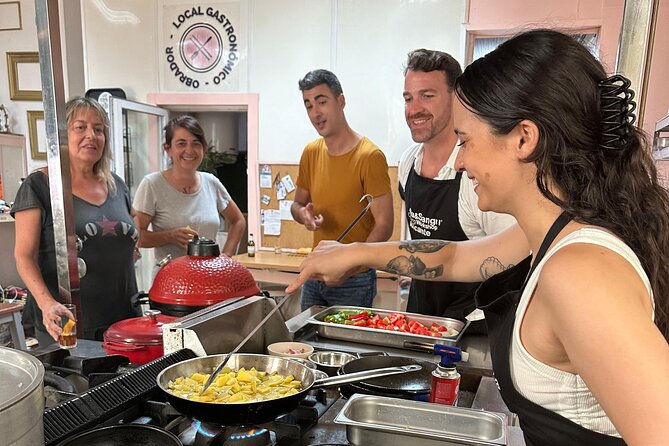 Evening Spanish Tapas Cooking Class with Live Guitar Music - Making tortilla de patatas from the start