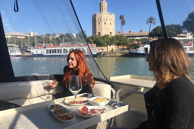 Exclusive Seville Boat Tour with Shared Tapas - A relaxed hour on the Guadalquivir