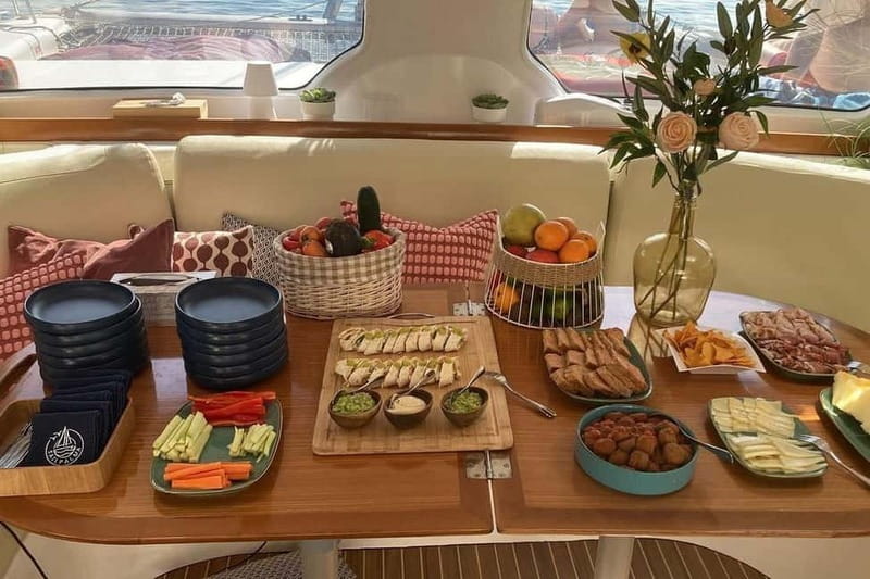 From Palma: Luxury Catamaran Group Tour with Tapas & Drinks - Sailing out from La Lonja Marina in Palma
