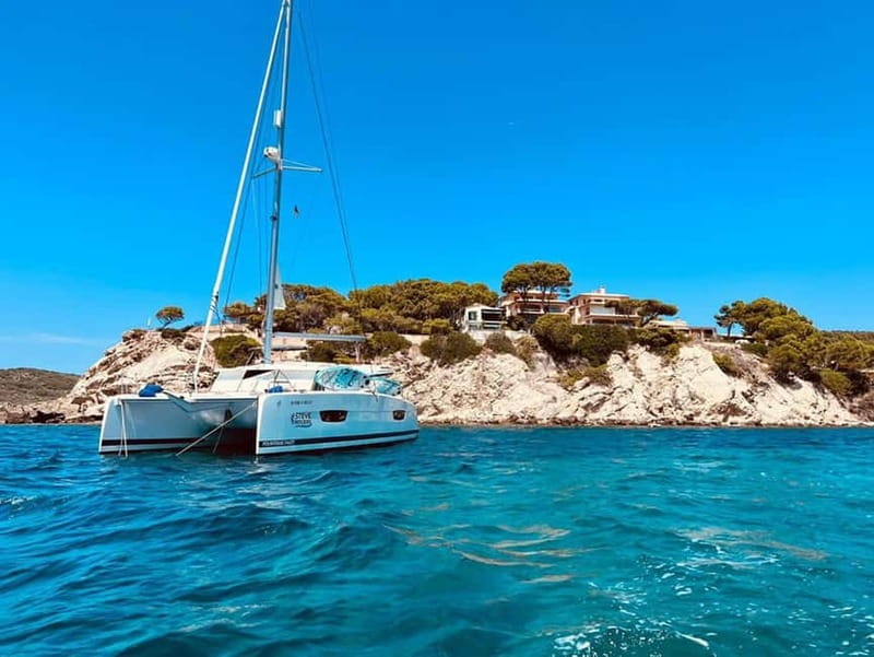 From Palma: Luxury Catamaran Group Tour with Tapas & Drinks - A four-hour rhythm of sailing, swimming, and snacks