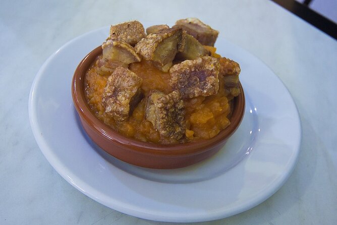 Gastronomic Tour: Discover the best “Wines and Tapas of Madrid” - Mesón Rincón de la Cava and the olive lesson