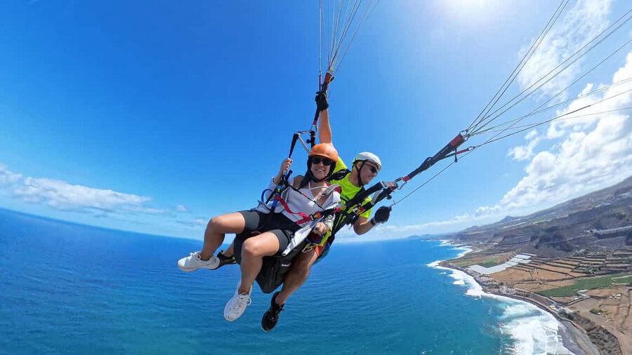 Gran Canaria: Paragliding Flight with Tapas & Pickup - Launching above volcanic cliffs and bays