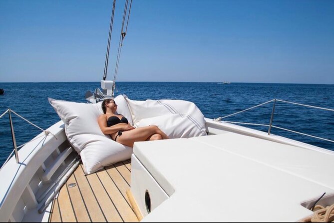 Ibiza: Private Sailboat with Tapas, Open Bar & Music - Cala Bassa and the Swimming Stop