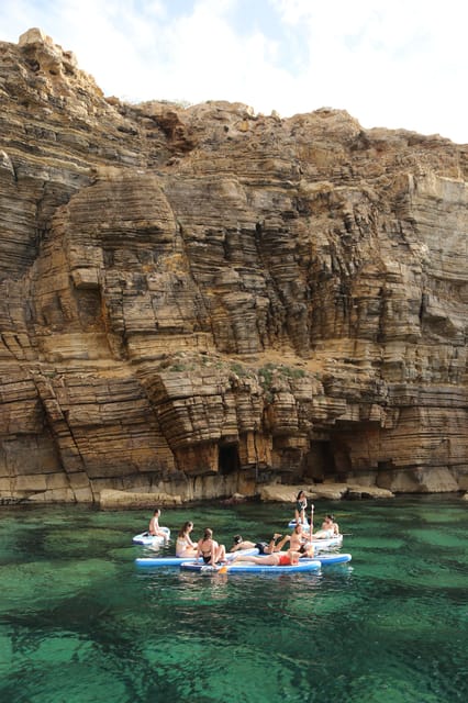 Ibiza: Scenic Sunset Cruise with Tapas and Drinks - Water time with snorkeling and paddleboarding