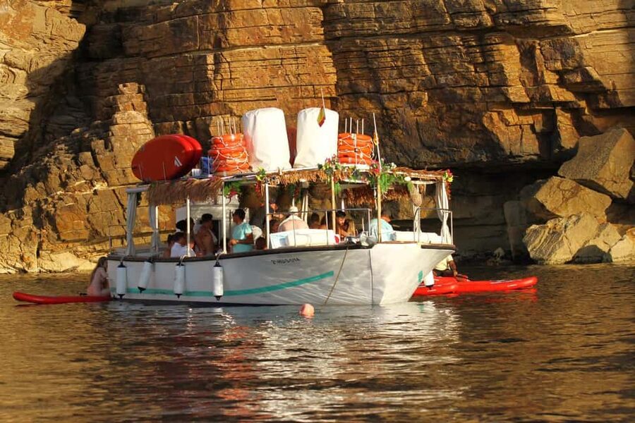 Ibiza: Sunset Boat Tour with Water Sports, Open Bar & Tapas - Café del Mar gives the cruise its postcard moment