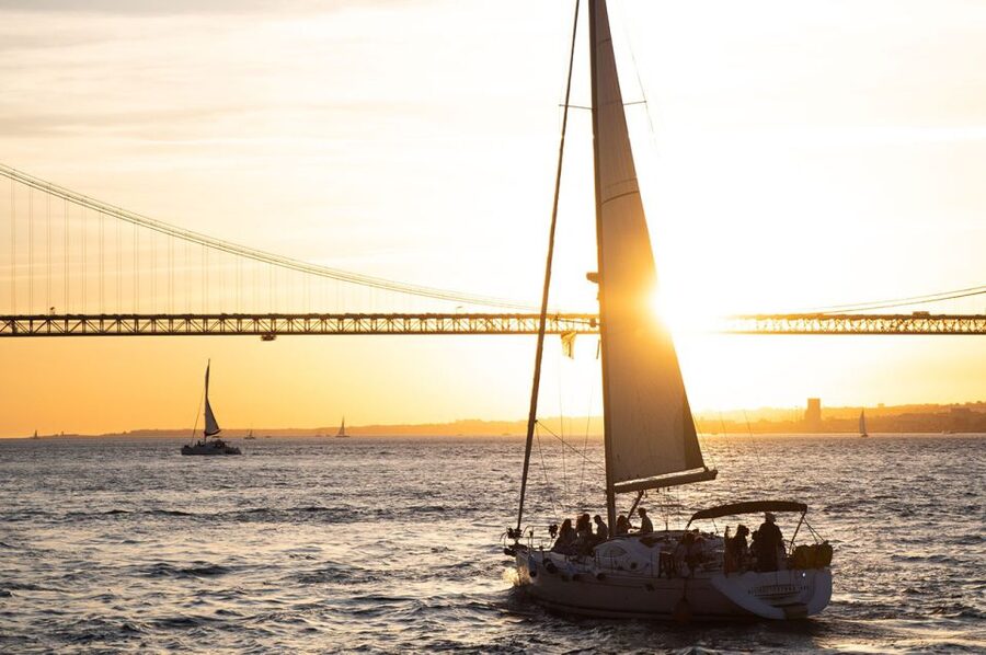 Lisbon: Alfama Charms, Tapas, Wine and Sunset Boat Cruise - Walking through Alfama’s steep old lanes