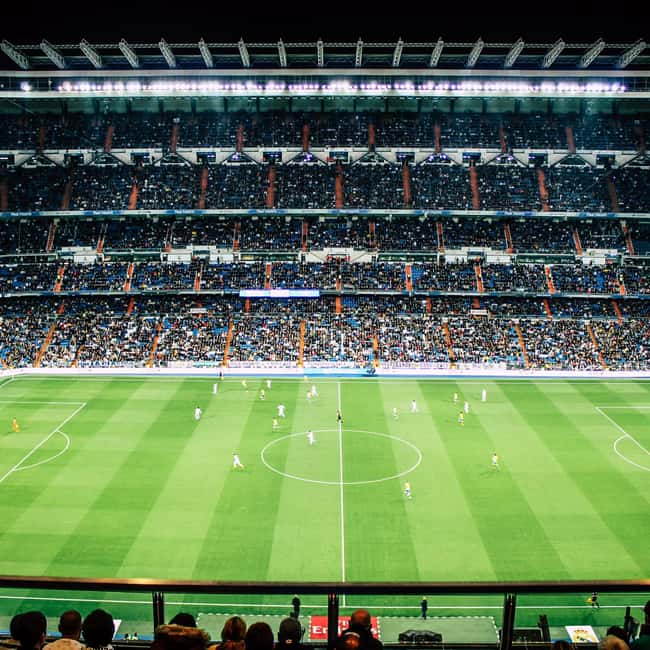 Madrid: Bernabeu Stadium and Museum Tour + Tapas - Holding the Champions League trophy