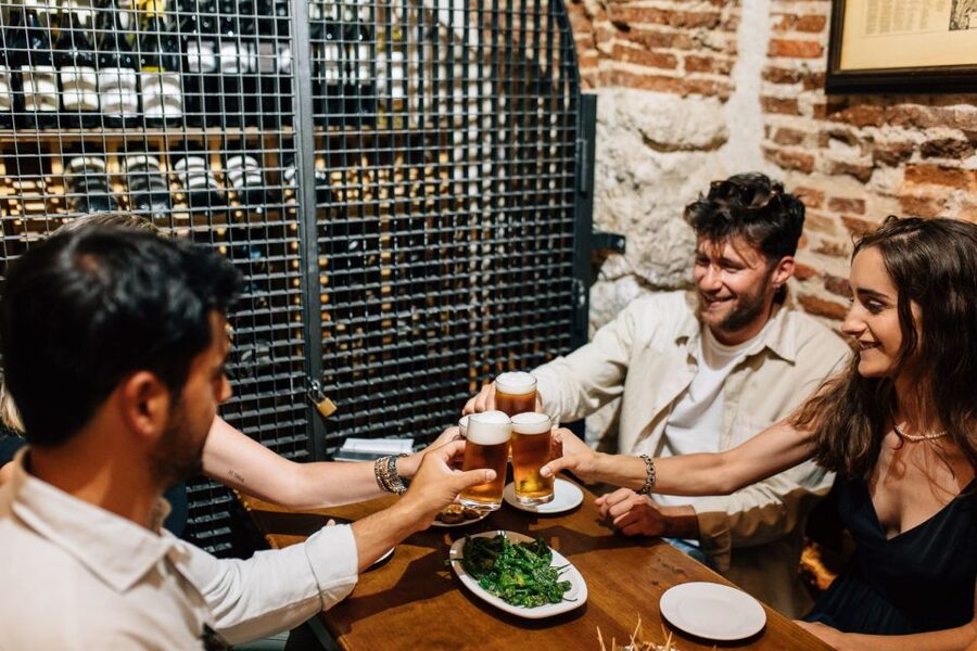 Madrid: Flamenco Show with Tapas and Wine Tour - Iberian ham at a specialist shop