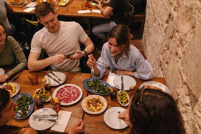 Madrid Food Walking Tour with Tapas and Vermouth - Tortilla, goat cheese, and a local beer